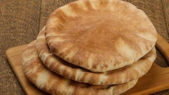 Fully automatic Arabic bread production line with 800 pcs per hour capacity, food-grade stainless steel construction, and adjustable thickness